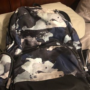 Gently used Tumi backpack